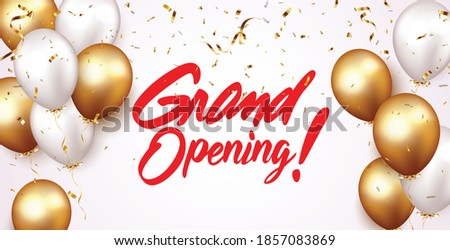 Grand opening ceremony with red balloon, gold  and confetti	
