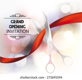 Grand opening invitation  card with red silk ribbon and bokeh background