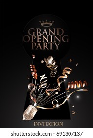 Grand opening sparkling gold elegant invitation card with bottle of champagne, curly serpentine and key hole shaped frame.