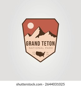 Grand teton national park logo depicting mountains and a sun.