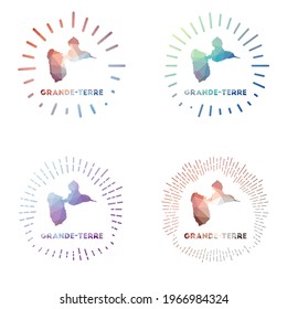 Grande-Terre low poly sunburst set. Logo of island in geometric polygonal style. Vector illustration.