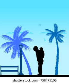 Grandfather carrying a child piggyback on the beach, one in the series of similar images silhouette