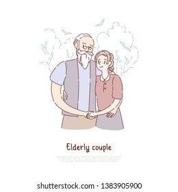 Grandfather and grandmother standing together, elderly couple hugging, old married pair, happy retirement banner