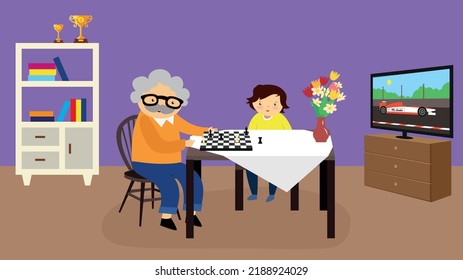 Grandfather plays chess with his grandson at the table in the room in front of the TV