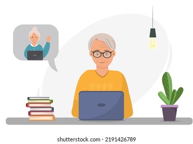 Grandfather talking online via laptop with his friend, communicating online with grandmother, communication of elderly person concept, using modern technologies by elderly people, retired man chatting