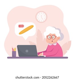 Grandma orders groceries online. Elderly woman with a laptop