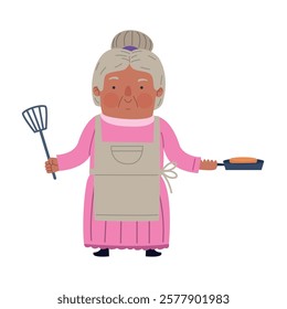 Grandma wearing a pink apron holding a spatula and frying a cake in a pan