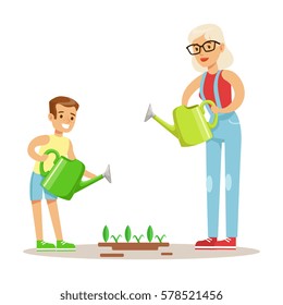 Grandmother And Boy Watering Plants, Part Of Grandparents Having Fun With Grandchildren Series