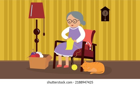 Grandmother knits a scarf sitting in a chair next to the cat
