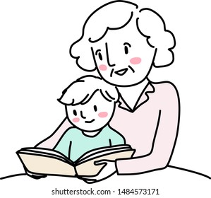 Grandmother reading bedtime story with little boy. Woman reading a storybook to her grandson. Little boy reading a storybook together with grandma. Senior woman spending happy family time with kid.