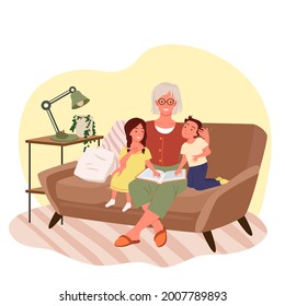 Grandmother reading book to children, grandma and girl boy child sitting on sofa couch