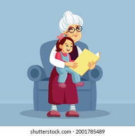 Grandmother Reading a Story Book to her Granddaughter.Happy grandma and grandchild bonding in loving a Story time family moment
