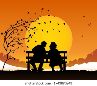 Grandparents are sitting on a bench. Look at the beautiful sunset.