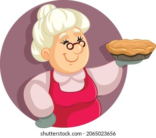 Granny Holding a Pie Vector Cartoon Illustration. Funny senior lady cooking a hot homemade meal 
