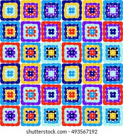 Granny squares pattern and Ripples Afghan. Crochet blanket of square elements, handmade, multicolored knitted squares, cozy blanket.