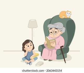 Granny telling tales and reading stories to cute granddaughter, while cat sleeping on the couch. Cute granny, little girl and kitty scene indoors inside room. Little girl sitting on floor.