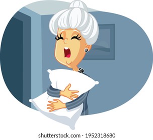 Granny Yawning Feeling Sleeping Holding a Pillow. Tired exhausted senior elderly woman going to sleep at night. 
