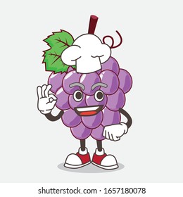 Grape cartoon mascot character in a chef dress and white hat