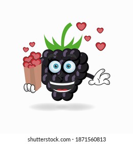 Grape mascot character holding a love icon. vector illustration