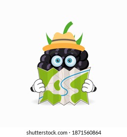 The Grape mascot character holds a map. vector illustration