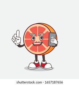 Grapefruit cartoon mascot character speaking on the phone