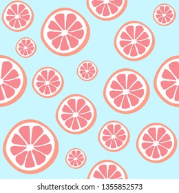 Grapefruit  seamless vector pattern.  Seamless pattern with grapefruit on blue background. Fruit background. Grapefruit slices pattern.