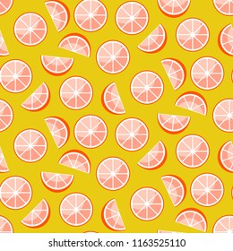 Grapefruit slices on yellow background. Citrus seamless vector pattern.