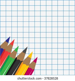 Graph paper with pencil crayons