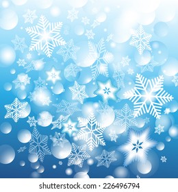 graphic blue winter holiday background with white glowing snowflakes  
