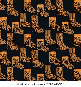 Graphic contour pattern of Halloween socks with holiday attributes. Vector image for packaging paper, textiles, scrapbooking