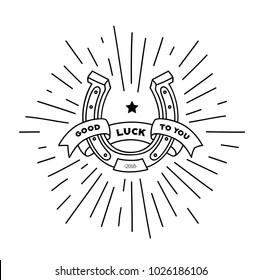 Graphic design element of horseshoes with ribbon and text on it, good luck to you, amulet, outline sketch