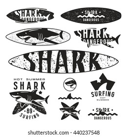 Graphic design with the image of shark for surfboard, t-shirt and design elements. Black print on white background