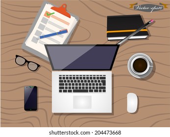 graphic design of laptop, cup of coffee, notebook, smartphone, glasses and computer mouse on desk in topview