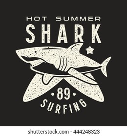 Graphic design for t-shirt with the image of shark. White print on black background