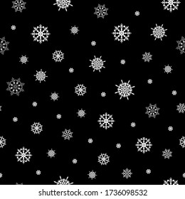 Graphic endless snowfall texture. Monochrome seamless tile with white snowflakes. Vector illustration for seasonal design and decoration cards, gift, covers, package