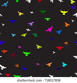 Graphic exotic seamless pattern with bright birds, exotic flying birds,wings, parrots on a black background. Vector colorful  birds abstract  background design. Funky style.
