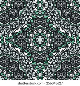 Graphic floral ornament, round ornamental doily seamless pattern.