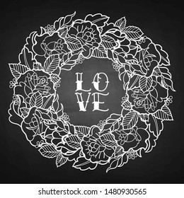 Graphic floral wreath isolated on chalkboard background. Vector vintage design