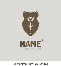Graphic flower on the background of the shield. Logo, illustration, design template. Company, shop, symbol concept icon. Element in vector.