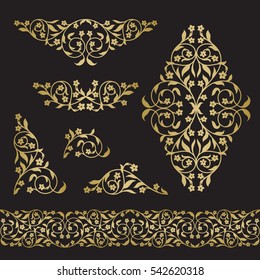 Graphic flower silhouettes in gold color on black background