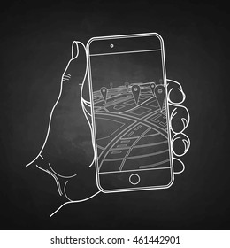 Graphic hand holding smartphone with GPS navigation on it. Vector line art isolated on chalkboard.