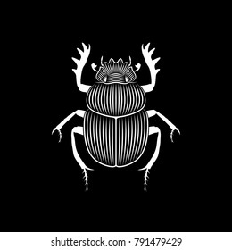 Graphic illustration of scarab engraved on black background