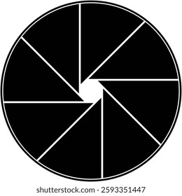 Graphic image shows an abstract circular shape divided into triangular sections, resembling a camera aperture in a black and white pattern.