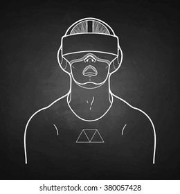 Graphic man with open mouth wearing virtual reality headset drawn in line art style. VR glasses isolated on the chalkboard. Modern cyber technologies for gaming