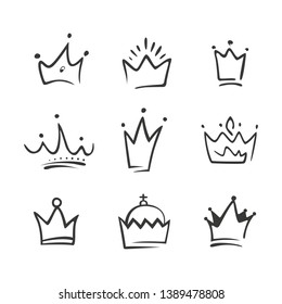 Graphic modernist element drawn by hand. royal crown of gold set. Isolated on white background. Vector illustration. Logotype, logo