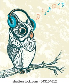Graphic owl with big blue headphones listening music on a branch. Vector cartoon illustration.