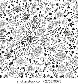 Graphic pattern with doodle flowers and cute animals. Doodle pattern with funny characters and flowers. Seamless pattern for fabric, paper and other printing and web projects.