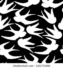 Graphic pattern of flying birds. silhuettes. Vector old school tattoo design