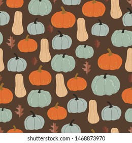 Graphic pumpkins and leaves seamless pattern. Vector backdrop. Halloween. Autumn Wrapping paper design template.