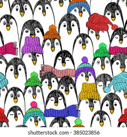 Graphic seamless pattern with cute hand drawn penguins in colorful hats and scarfs. Funny penguin background.